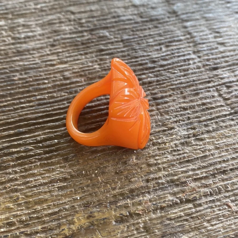 Vintage deeply carved Bakelite flower ring orange butter scotch egg yoke boho